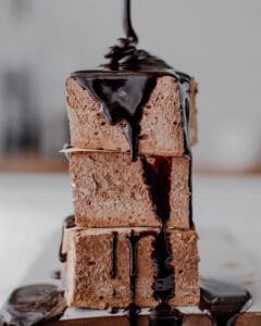 chocolate marshmallows stacked with chocolate dripping down